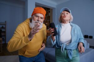 Elderly couple wearing trendy fashion outfit with youth clothing style